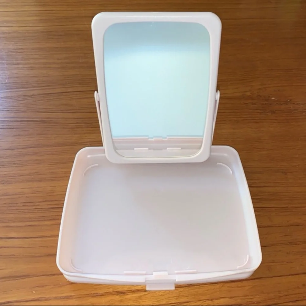 Mary Kay NWOT pink compact travel mirror. In original wrapping.